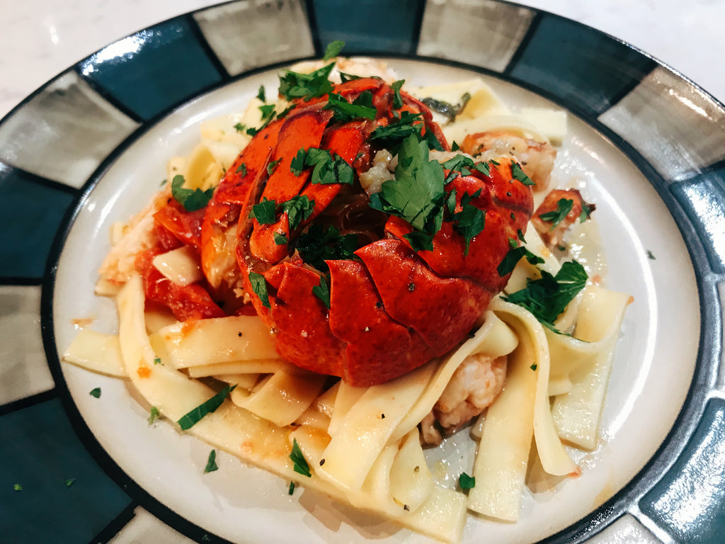 Tagliatelle with cherry tomatoes and lobster