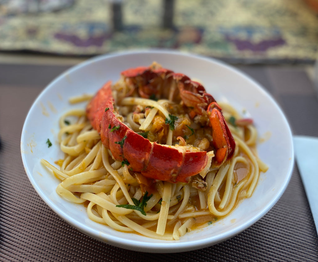 Linguine Pasta With Lobster Tails and Yellow Datterino Tomatoes